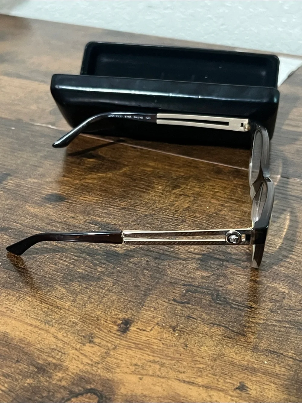 Versace Black Frame Sunglasses with Gold Temples